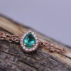 A chain ring with an emerald drop and diamonds around it - Image 4