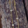 A chain wrapped in circles studded with diamonds - Image 6