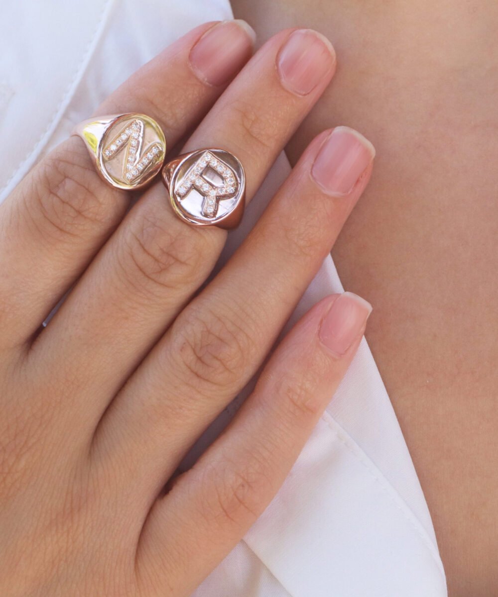 R signet ring set with diamonds