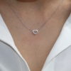 A heart-shaped pendant with a diamond - Image 2