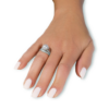 A gold ring studded with diamonds and a pearl - Image 3